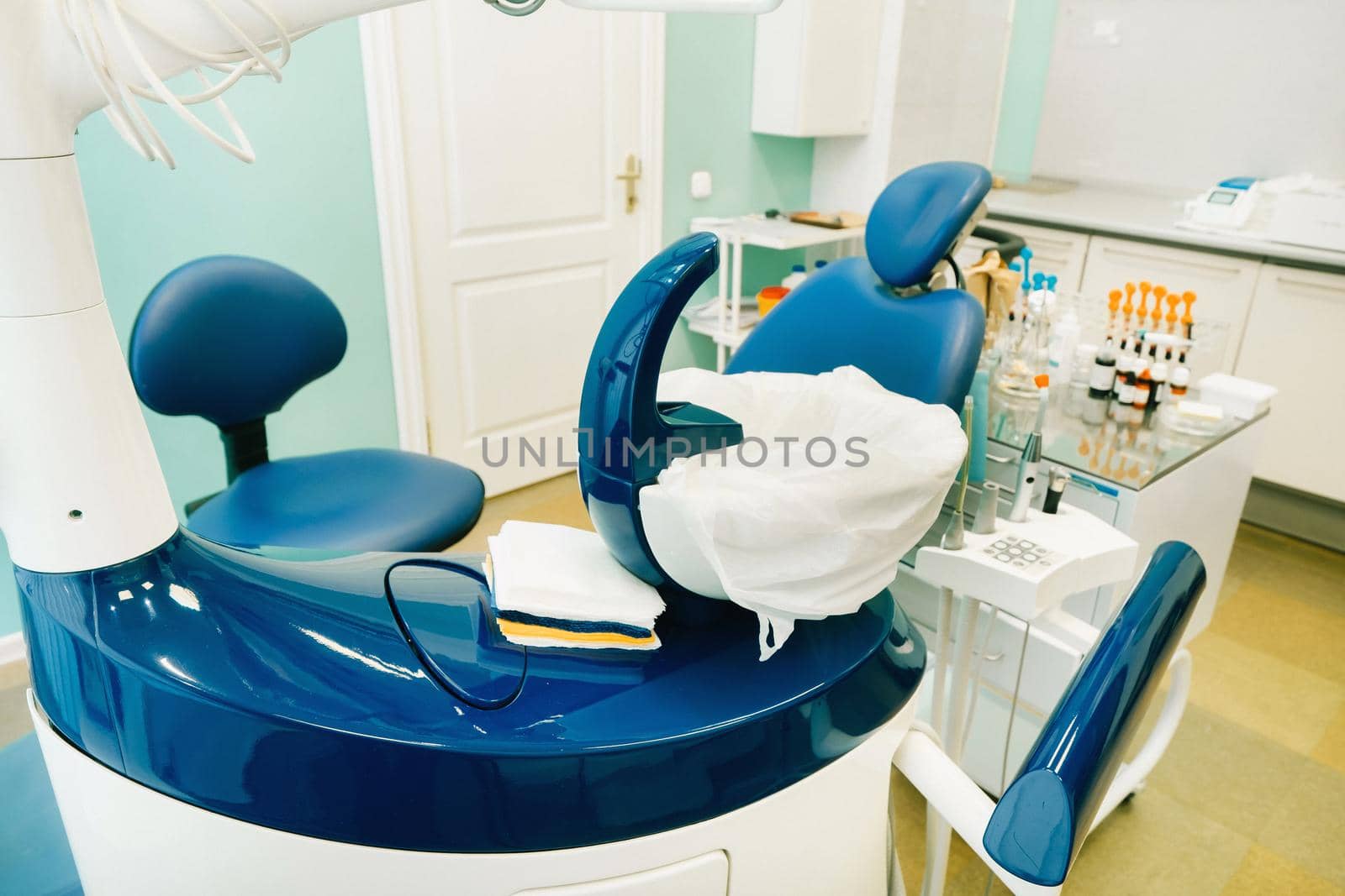 An empty chair in the dentist's office. Empty dentist's office.