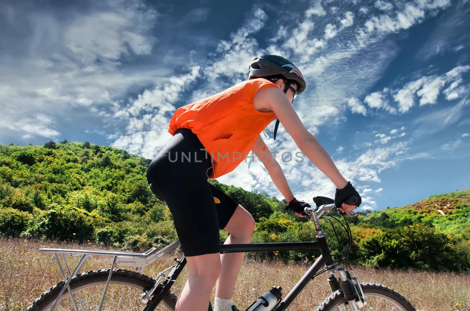 Mountain Biker with background of blue sky