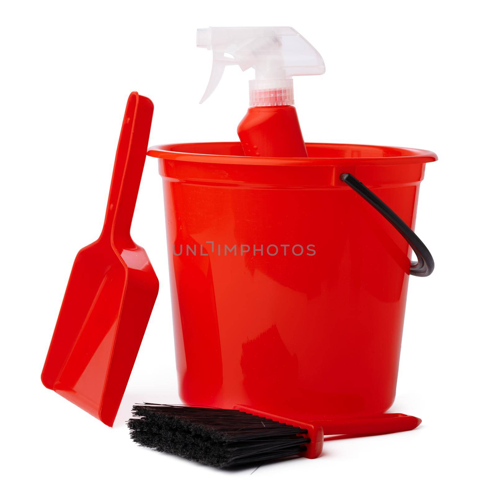 Red bucket with cleaning supplies isolated on white background, close up