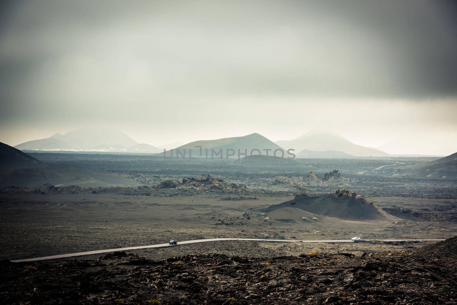 beautiful landscape with mountain road in Timanfaya National Park in Lanzarote, Canary Islands