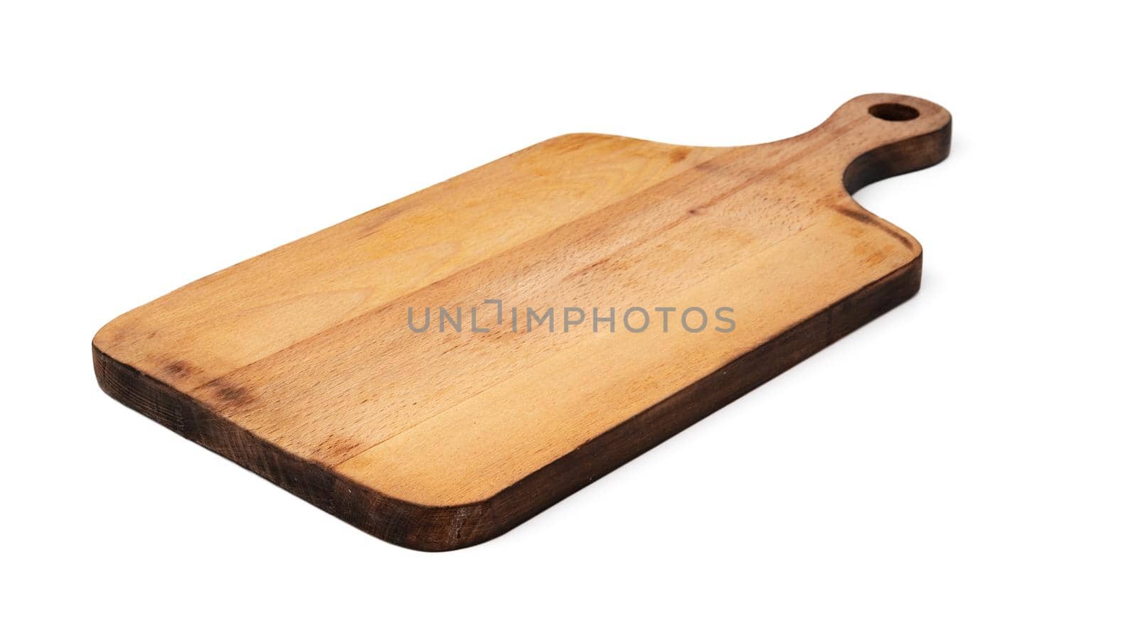 Wooden cutting board on a white background, close up