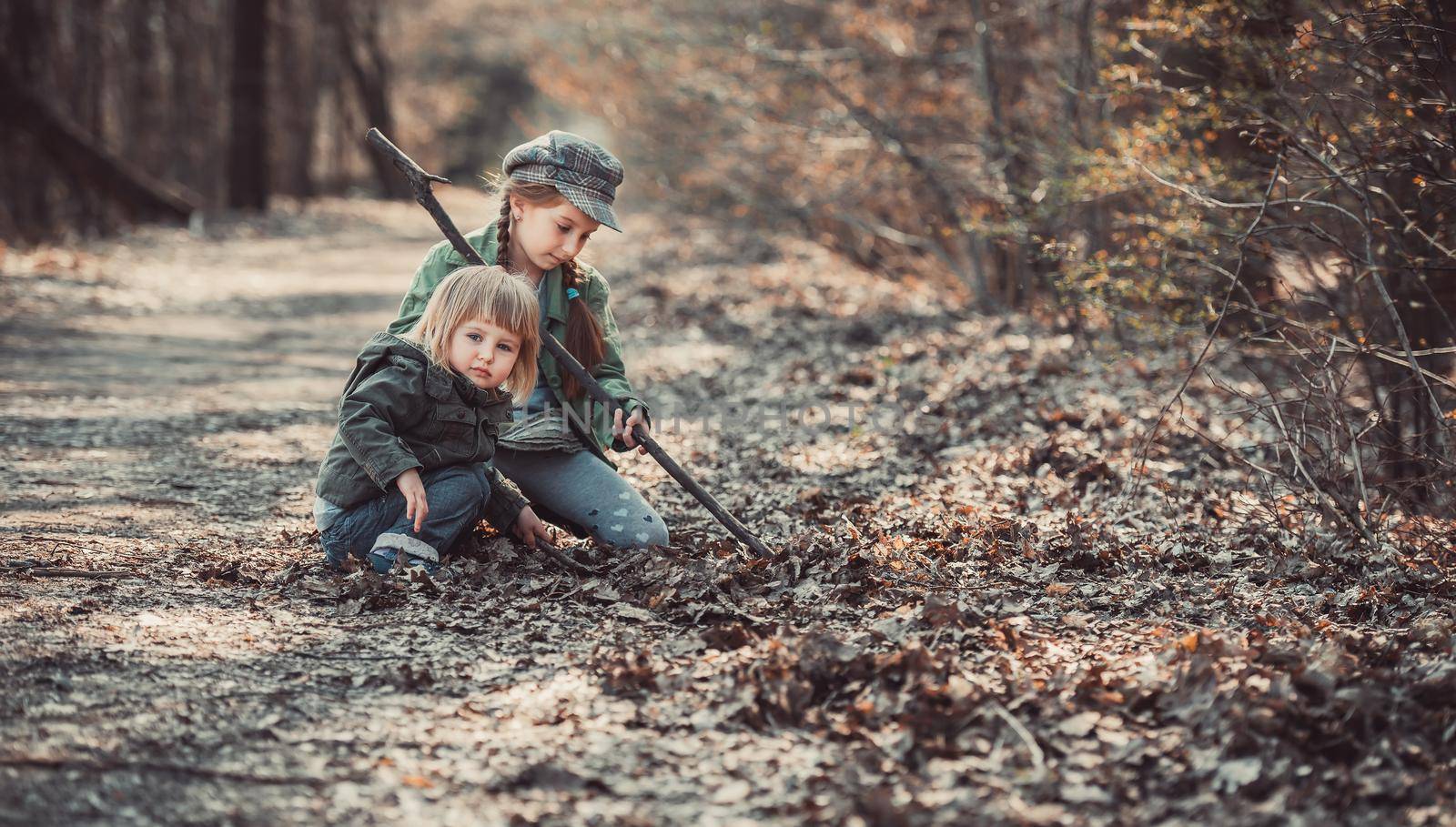 small children play in the woods, photo in vintage style