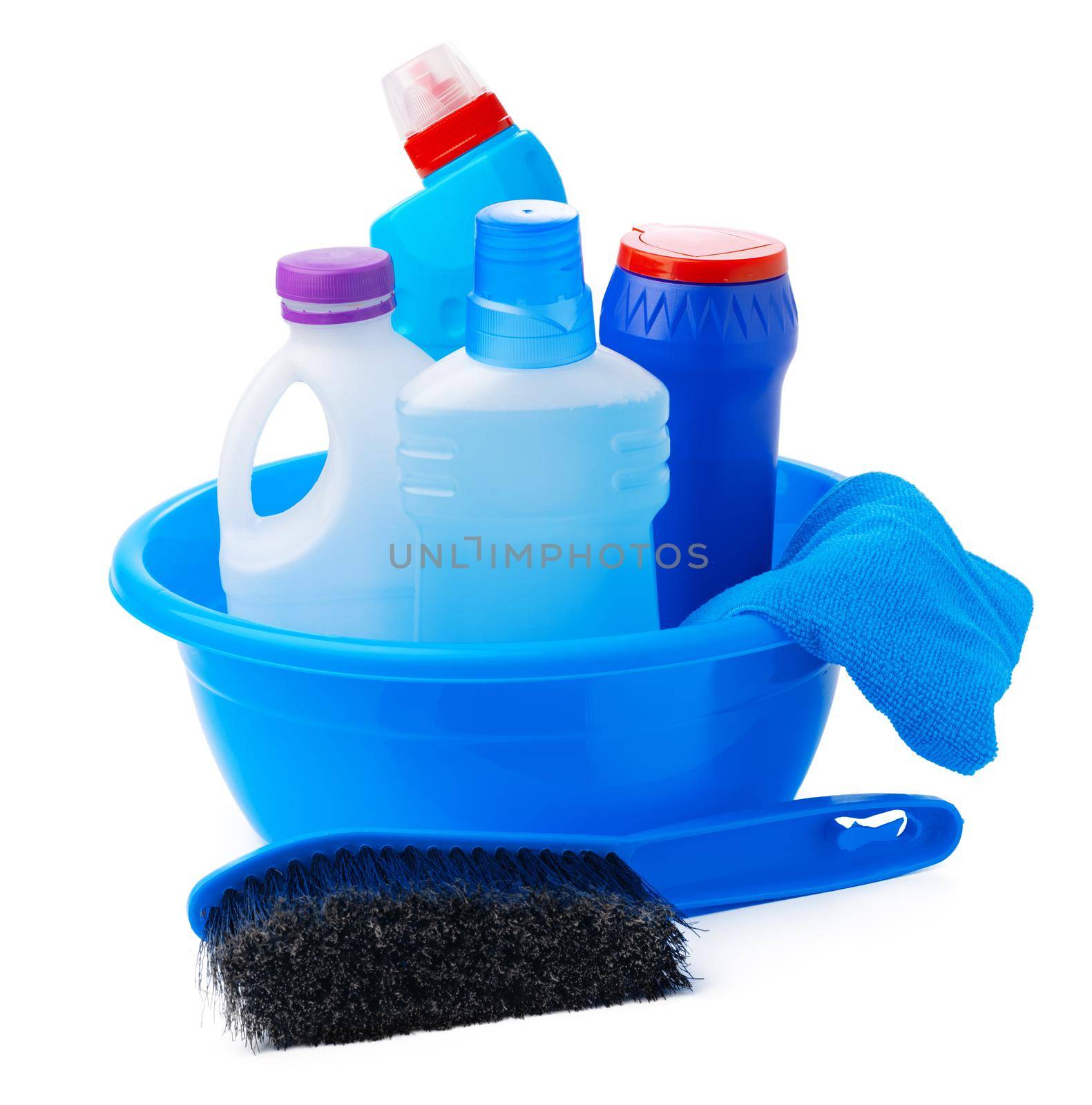 Cleaning items in a blue basin isolated on white background, close up