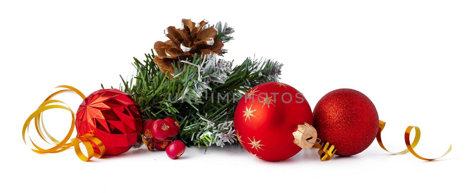 Christmas tree branch with Christmas baubles isolated on white background, copy space