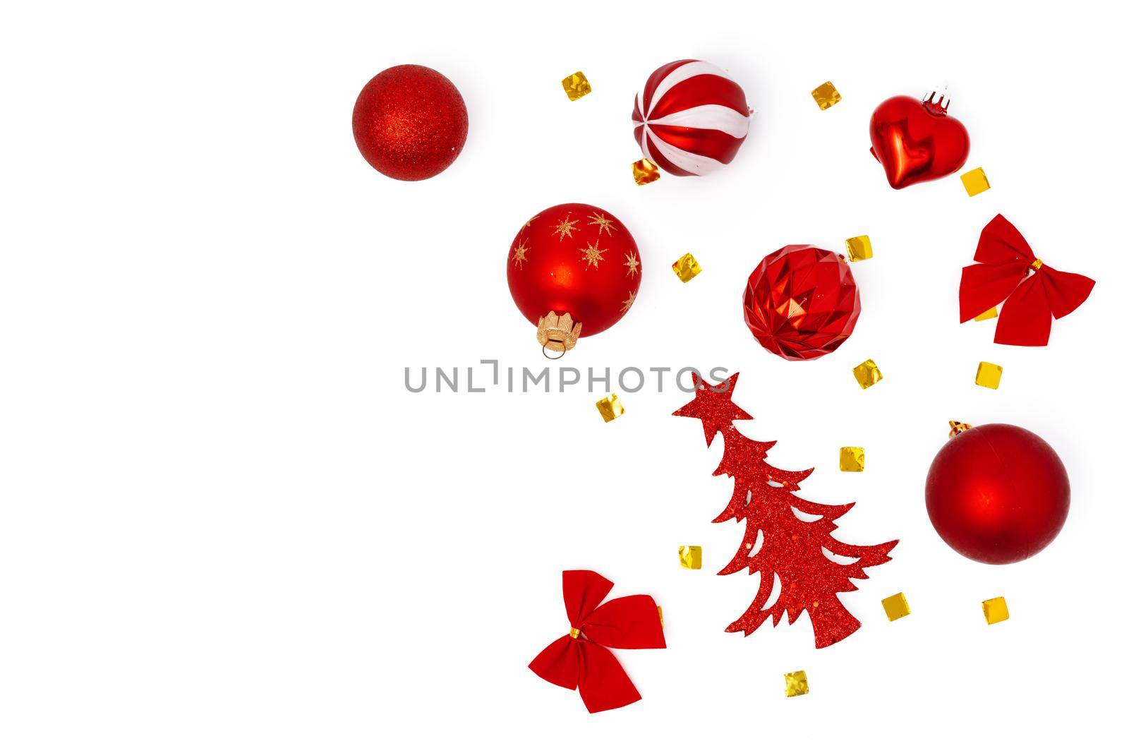 Top view of Christmas decorations composition on white background with copy space
