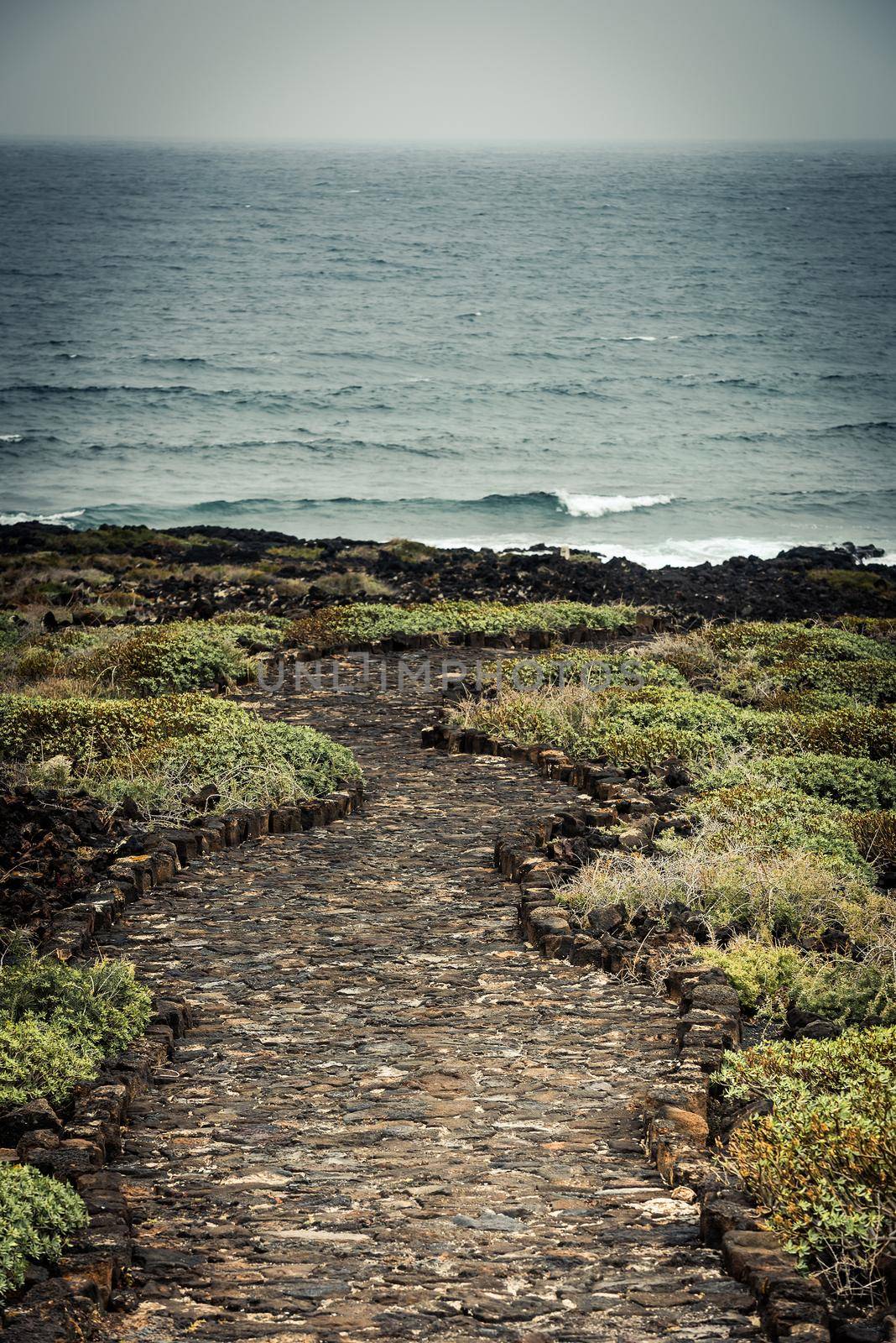 beautiful stone path to the sea horizone