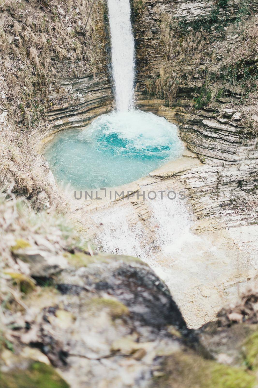 Nature landscape: waterfall and lagoon.