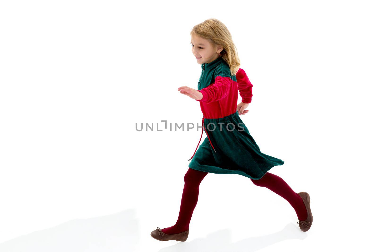 Cute little girl fun running around the room. The concept of family values, the game. Isolated on white background.