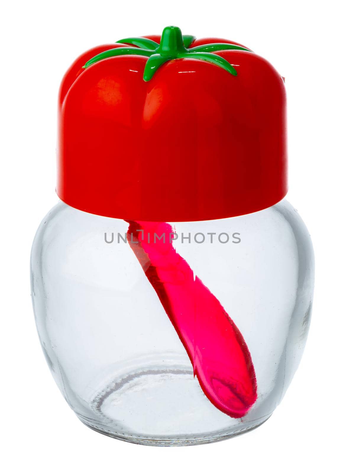 Empty salt shaker with tomato lid isolated on white background