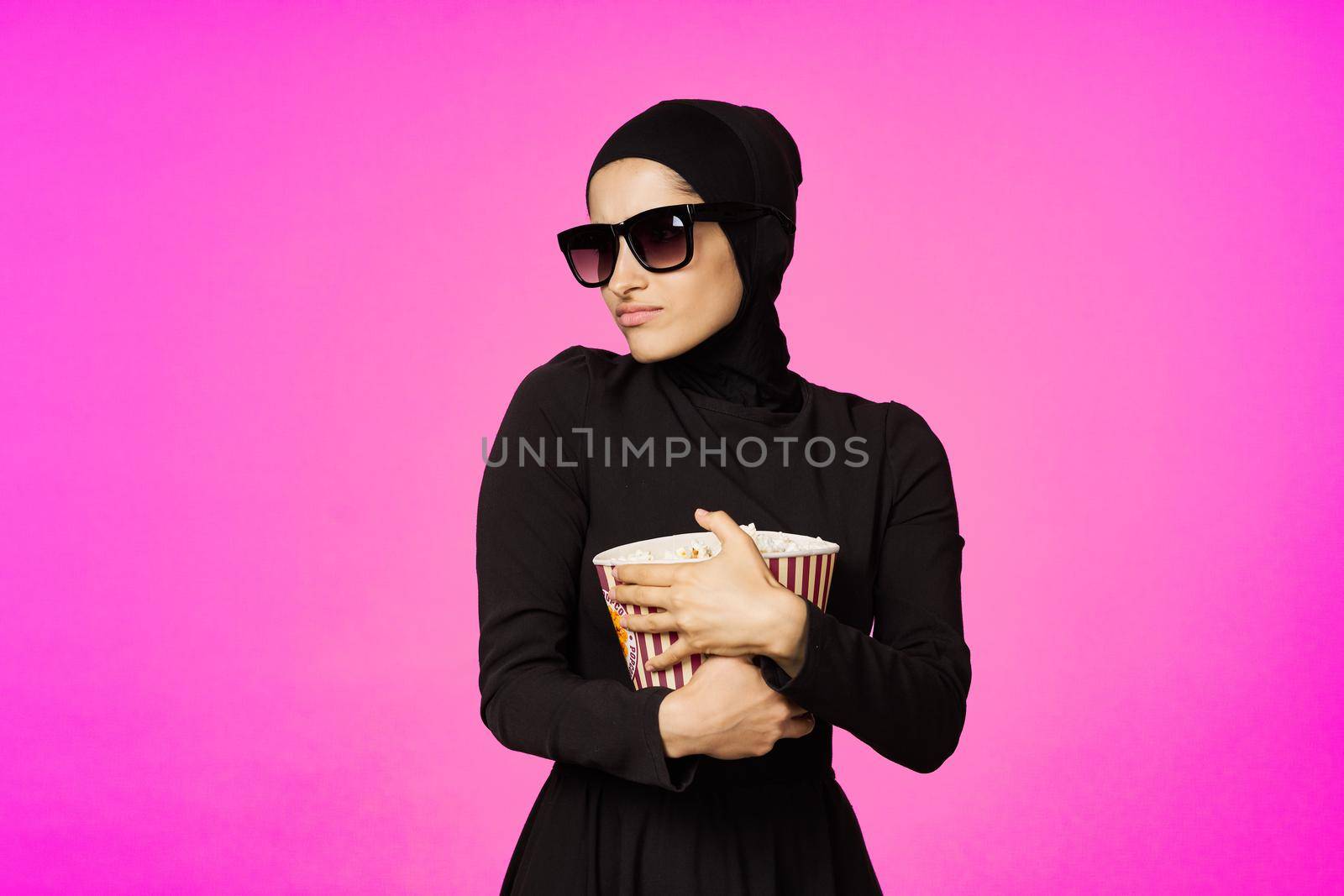 cheerful woman fun popcorn entertainment fashion model ethnicity. High quality photo