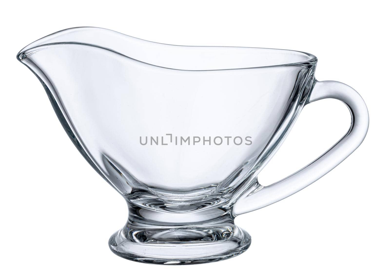 Glass empty gravy boat isolated on white background