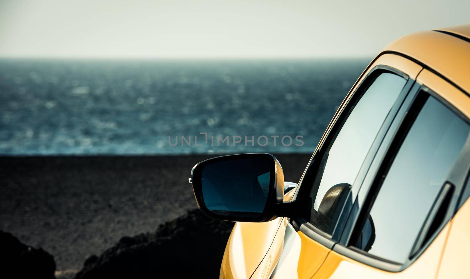 car on sea coast background