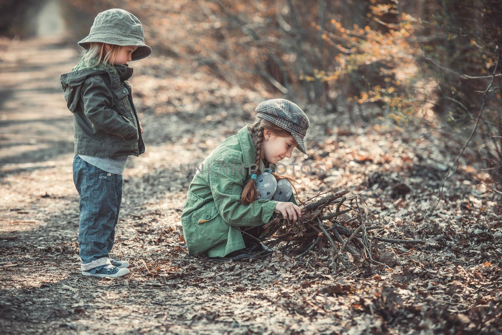 children play in the woods by GekaSkr