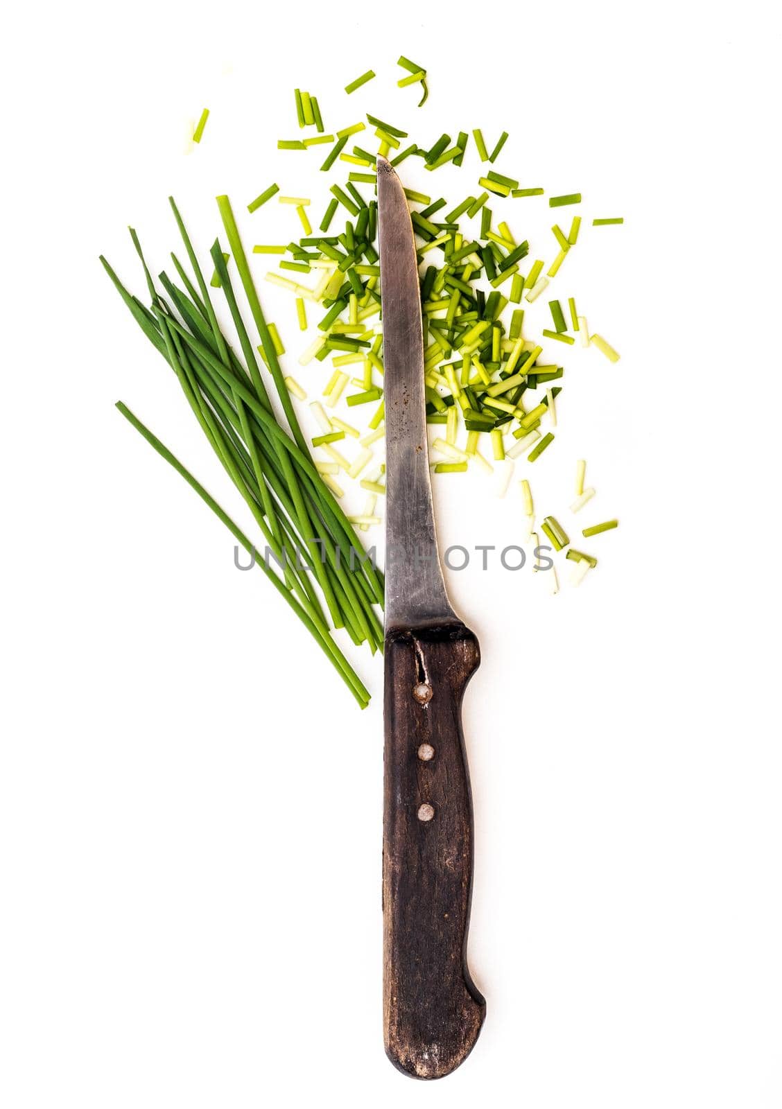 kitchen knife and green onions isolated on white background