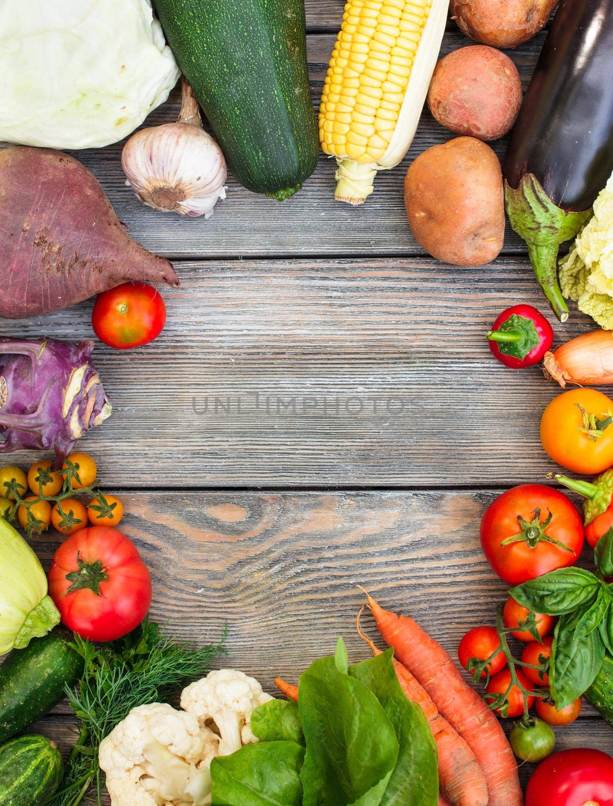 Various vegetables on a wooden table with copy space