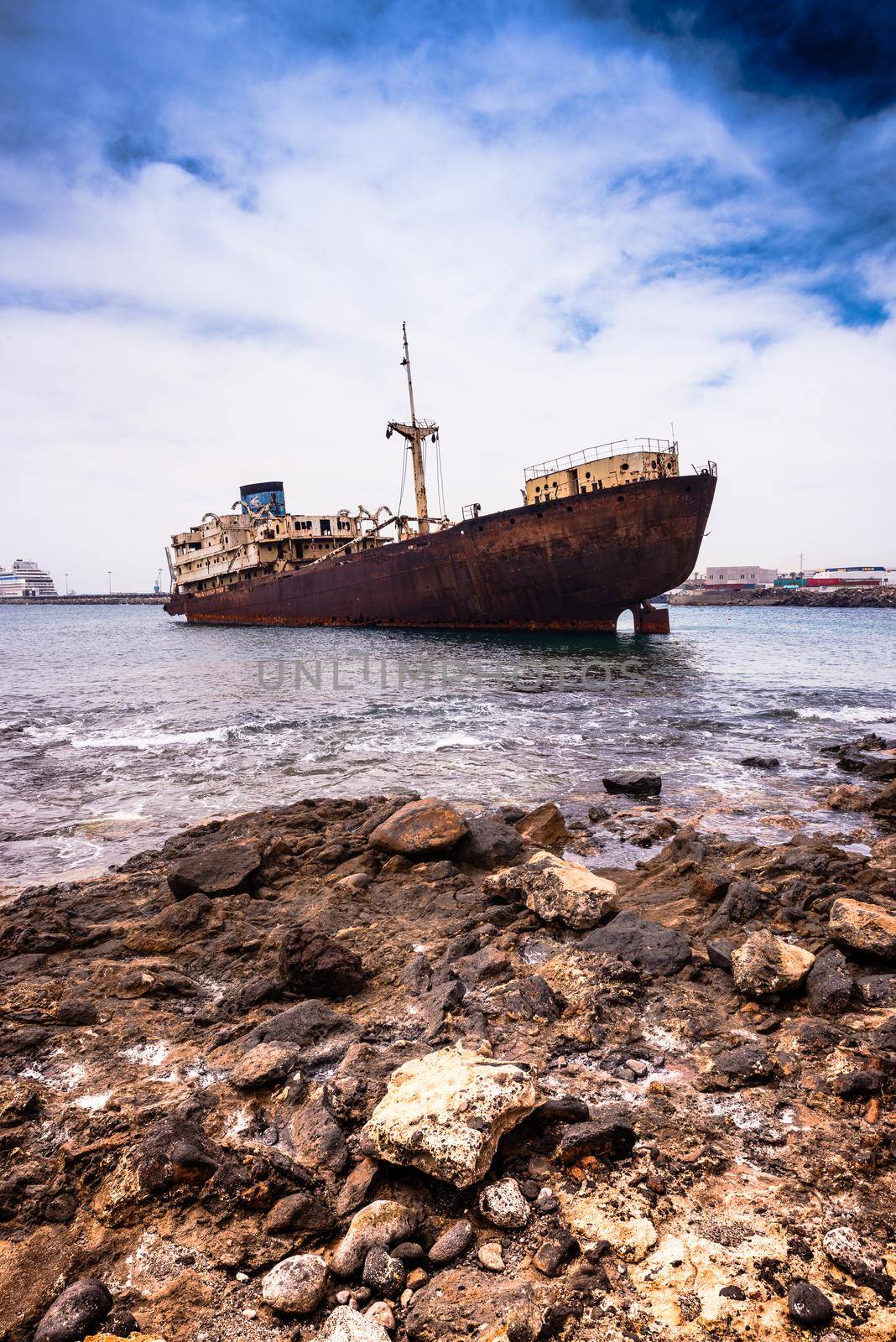 old broken ship agrounded near Lanzarote seashore, Canary Islands, Spain