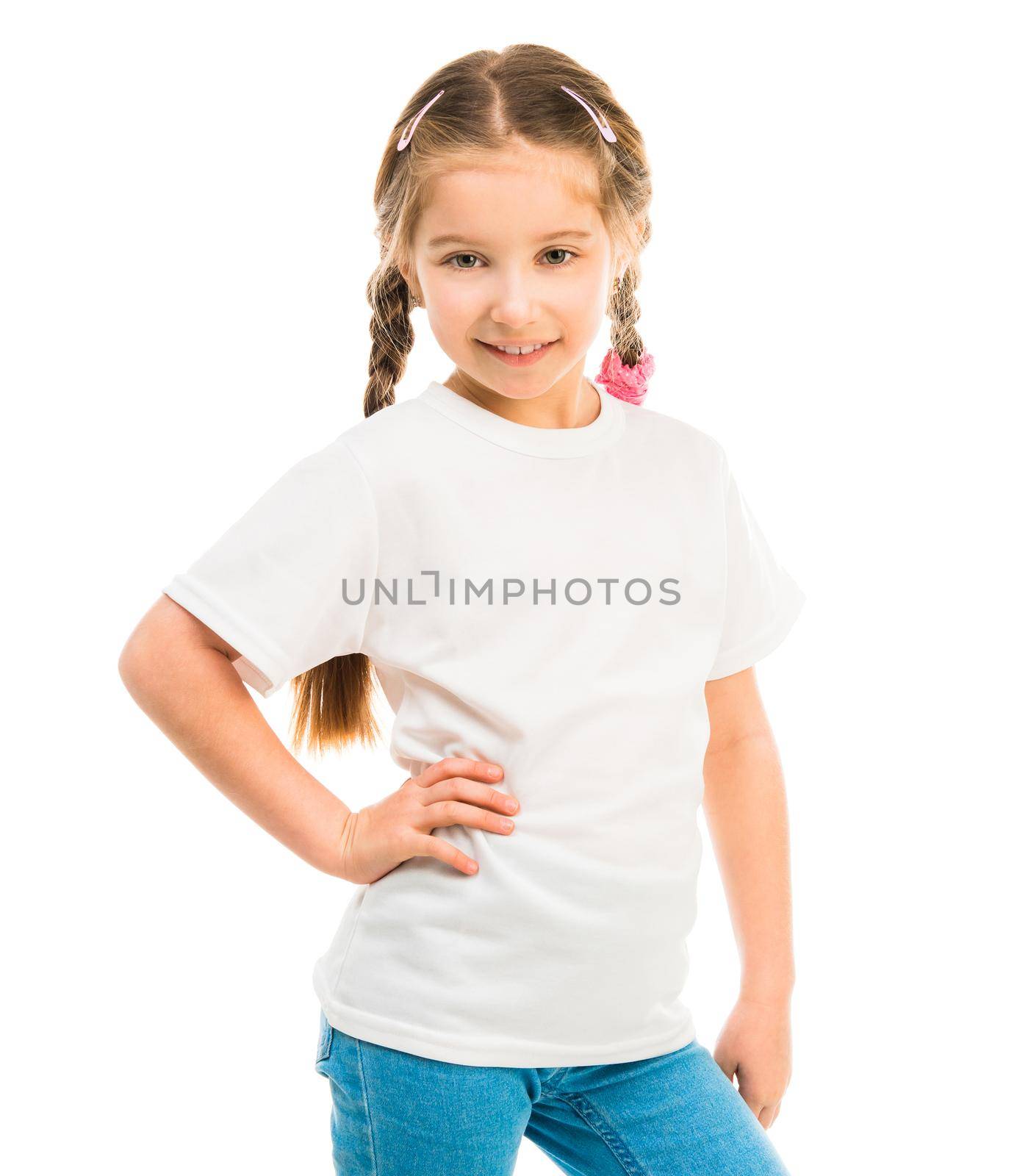 cute little girl in a white T-shirt and blue jeans on a white background