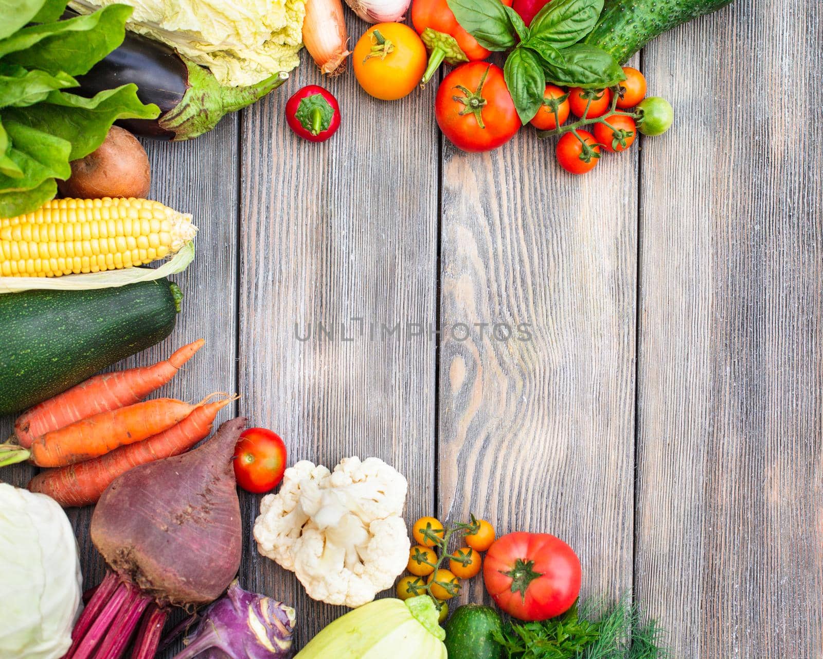 Various vegetables on a wooden table with copy space