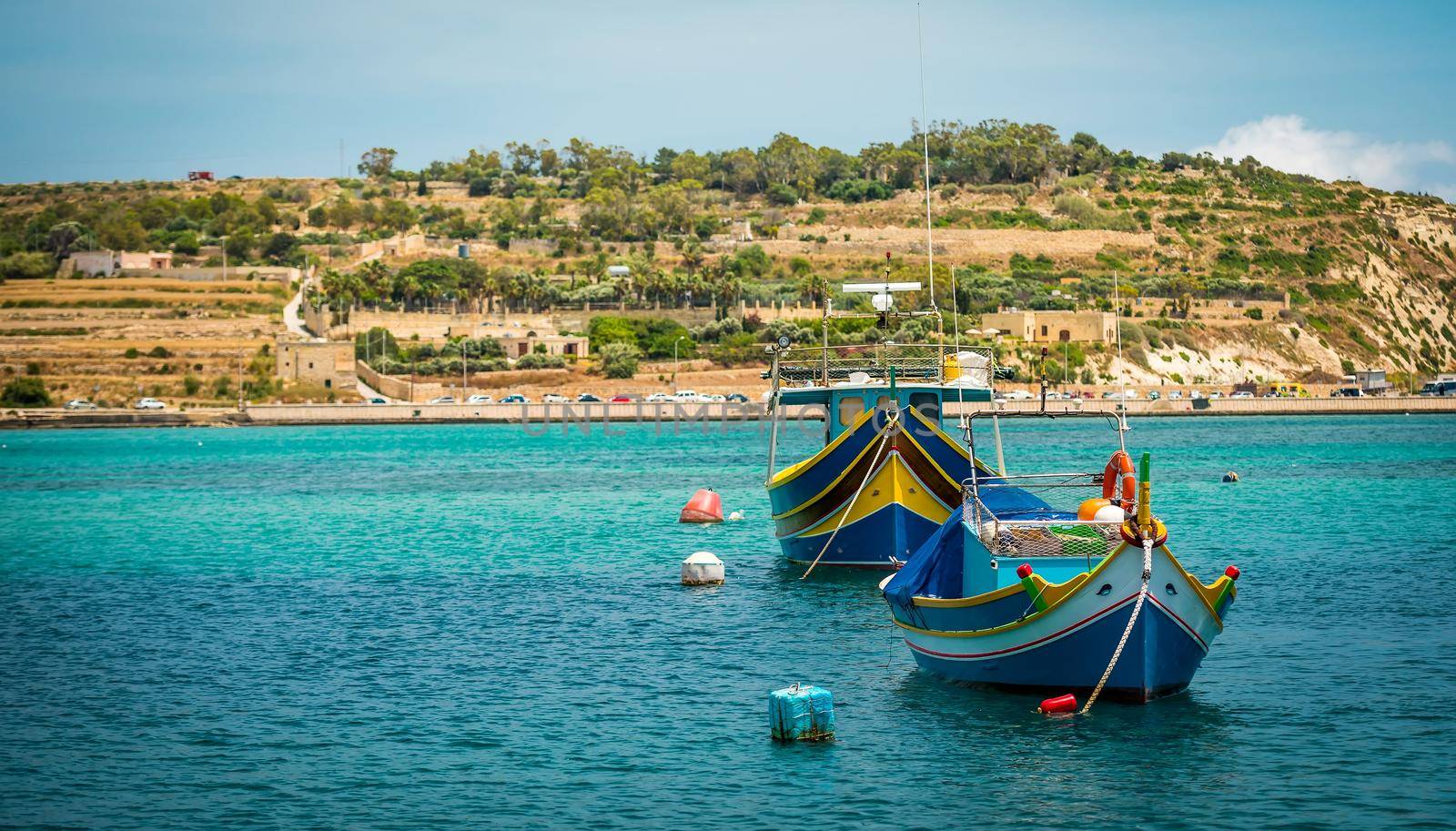 fishing boats near fishing village of Marsaxlokk (Marsascala) in Malta