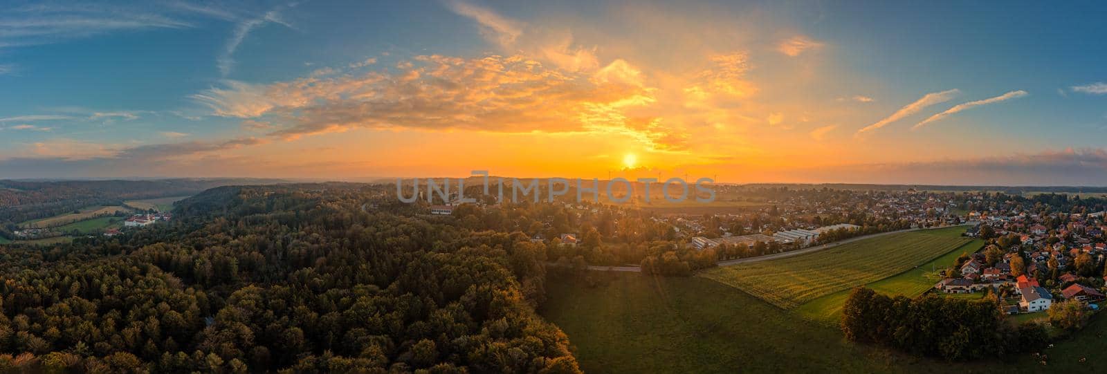 Sunset view over the beautiful landscape in southern bavaria with the monastery of Schaeftlarn
