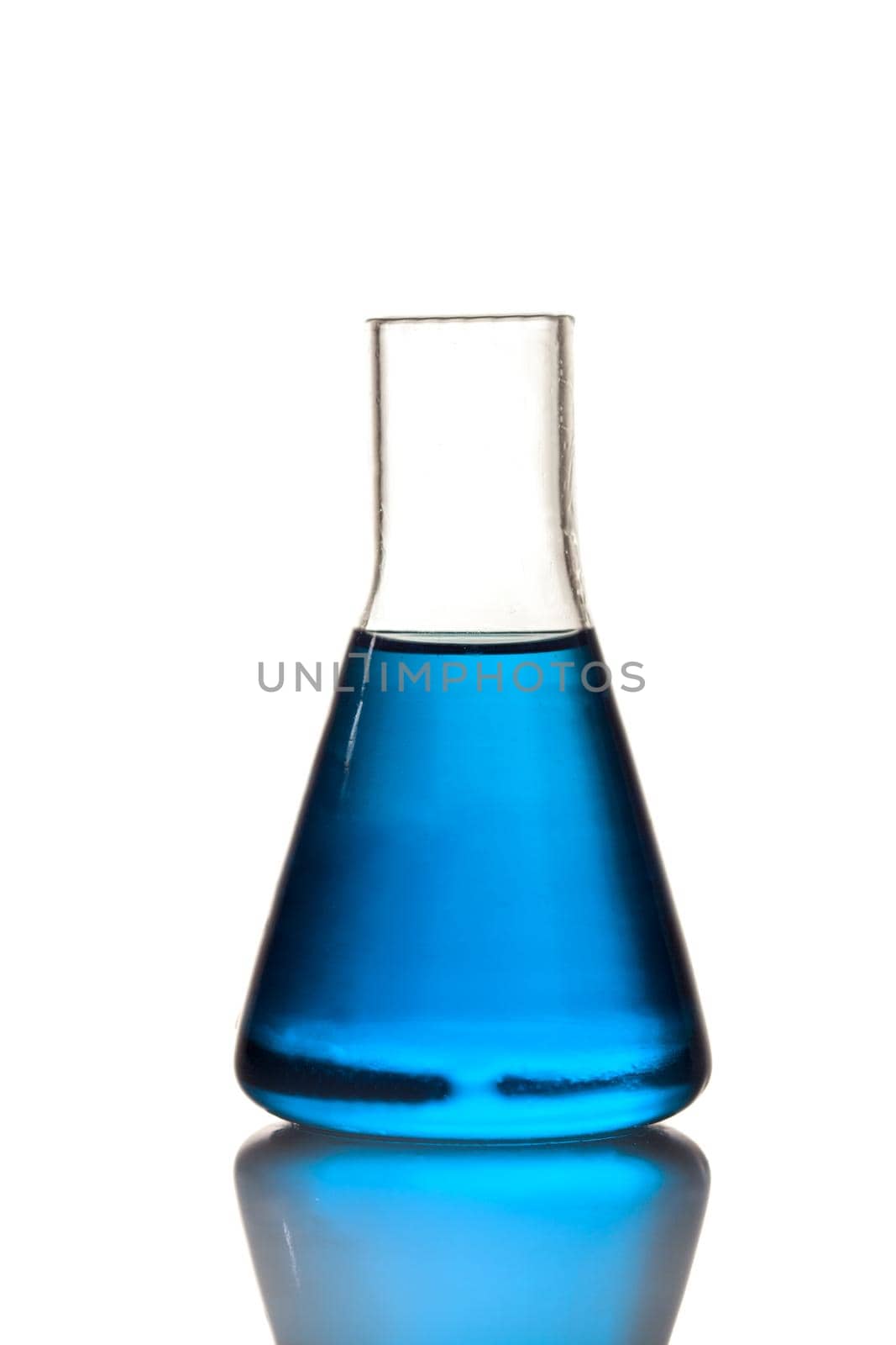 The conical flask with blue liquid on white - laboratory glass