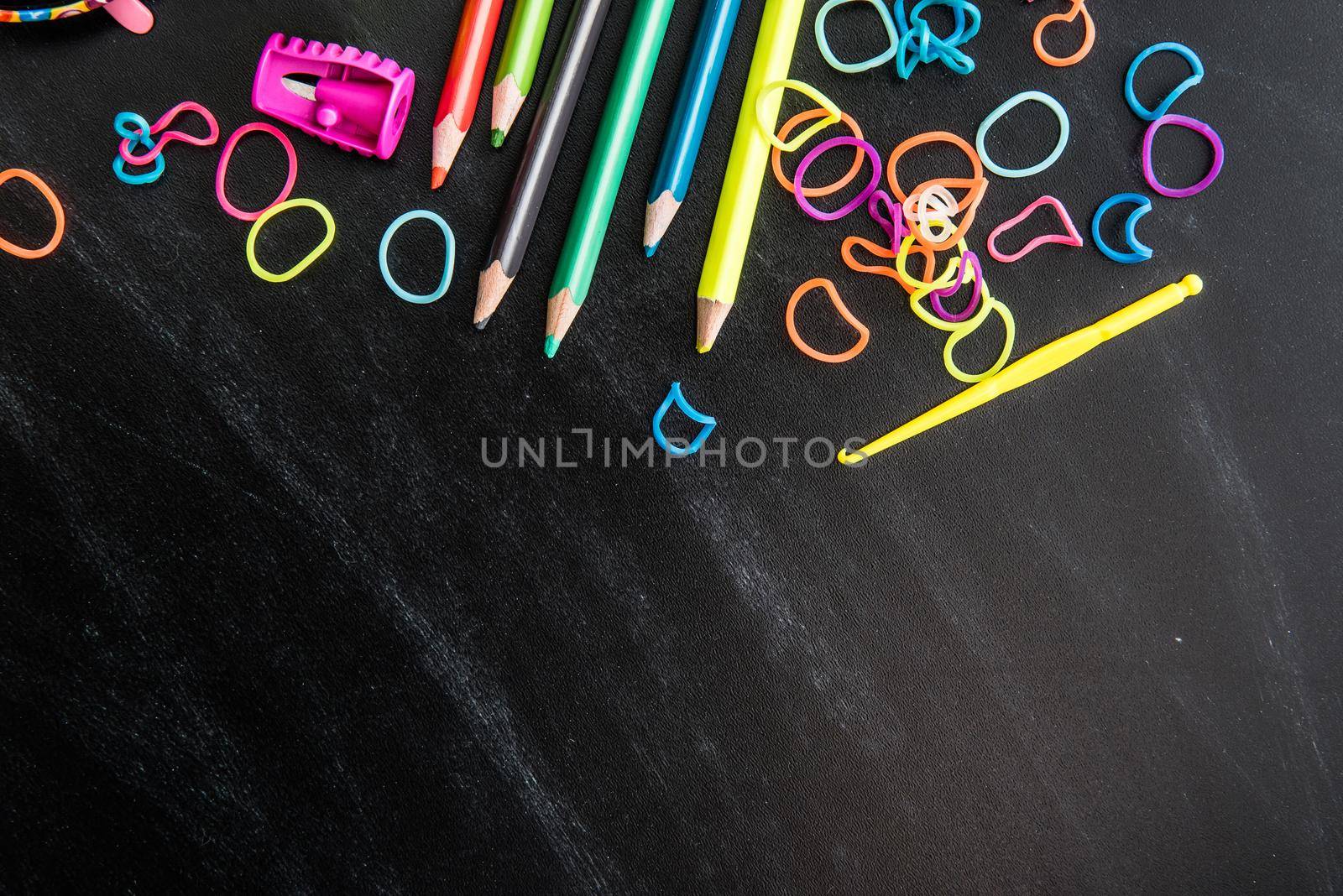 kid's stuff and sweets on a white background
