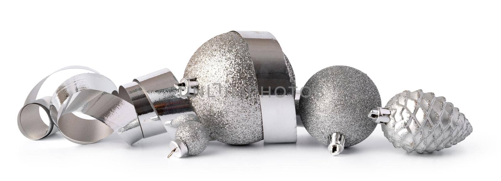 Silver sparkling Christmas baubles isolated on white background, close up