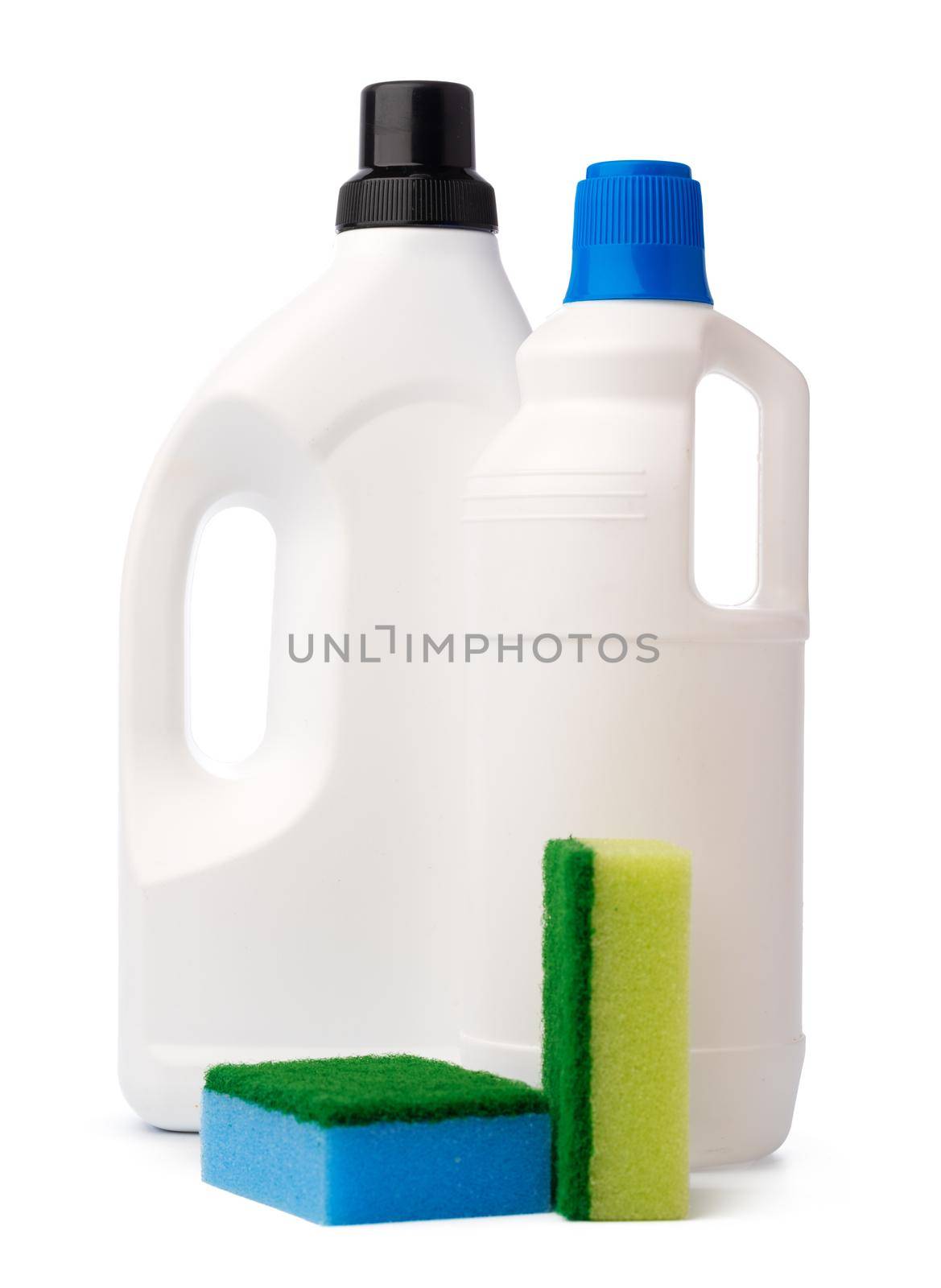 Bottles with cleaning products and sponge on a white isolated background, copy space