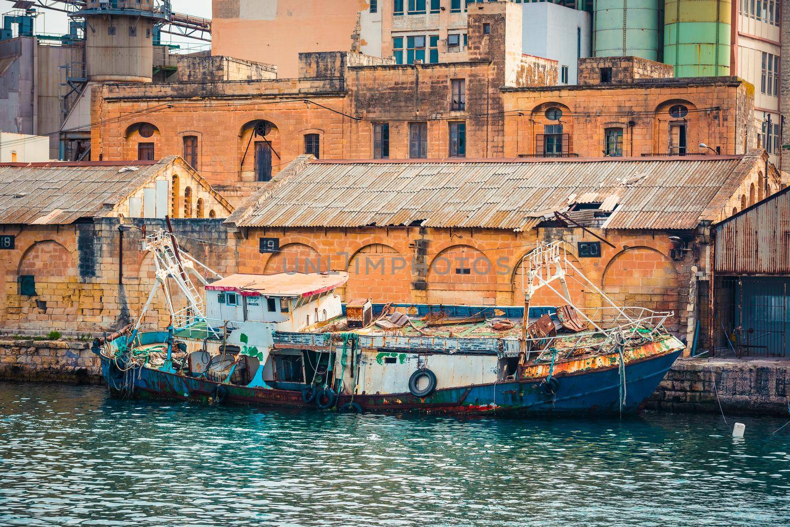 old ruined abandoned fising boat near Valletta in Malta