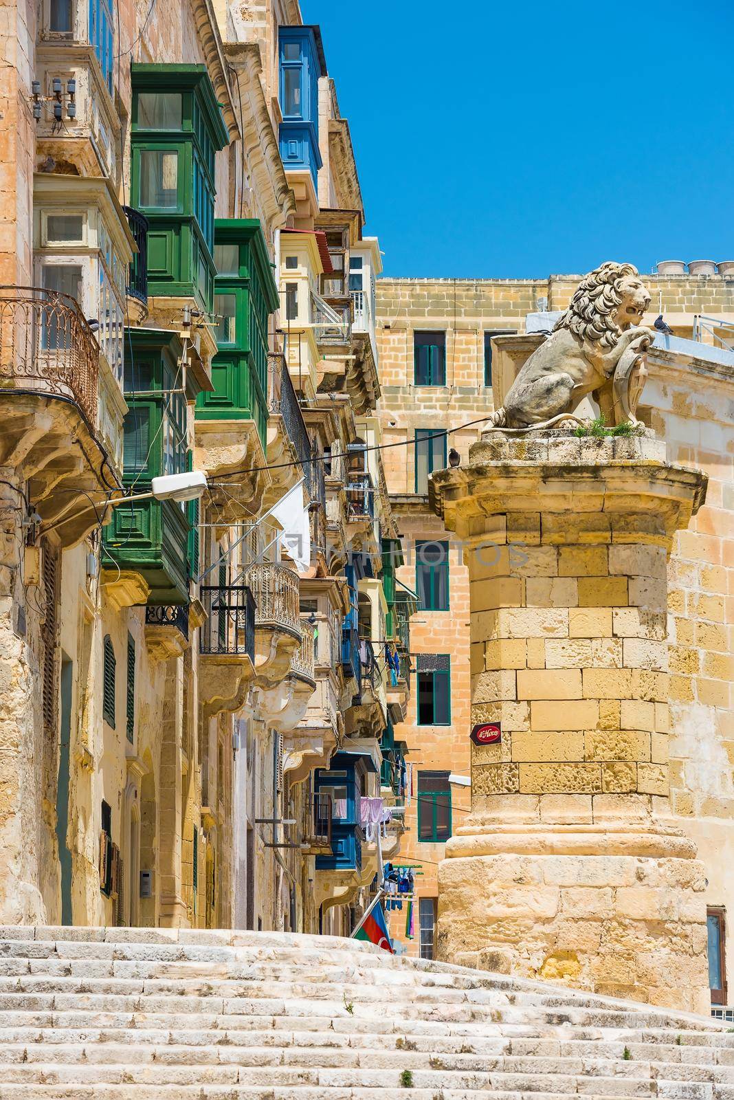 typical narrow street in Valletta by GekaSkr