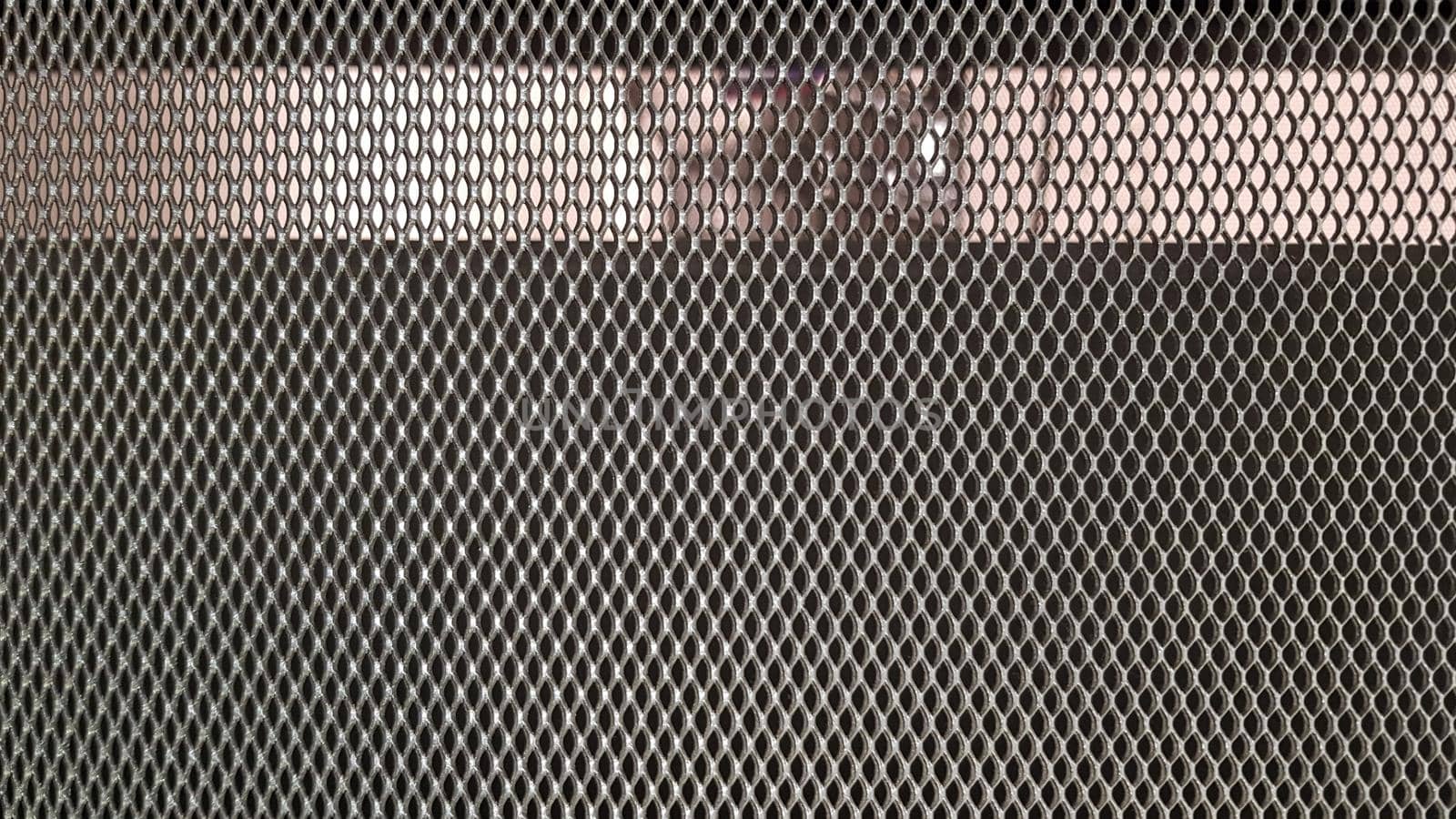 Abstract industrial metallic netting background, pattern, texture. Mesh gray background.