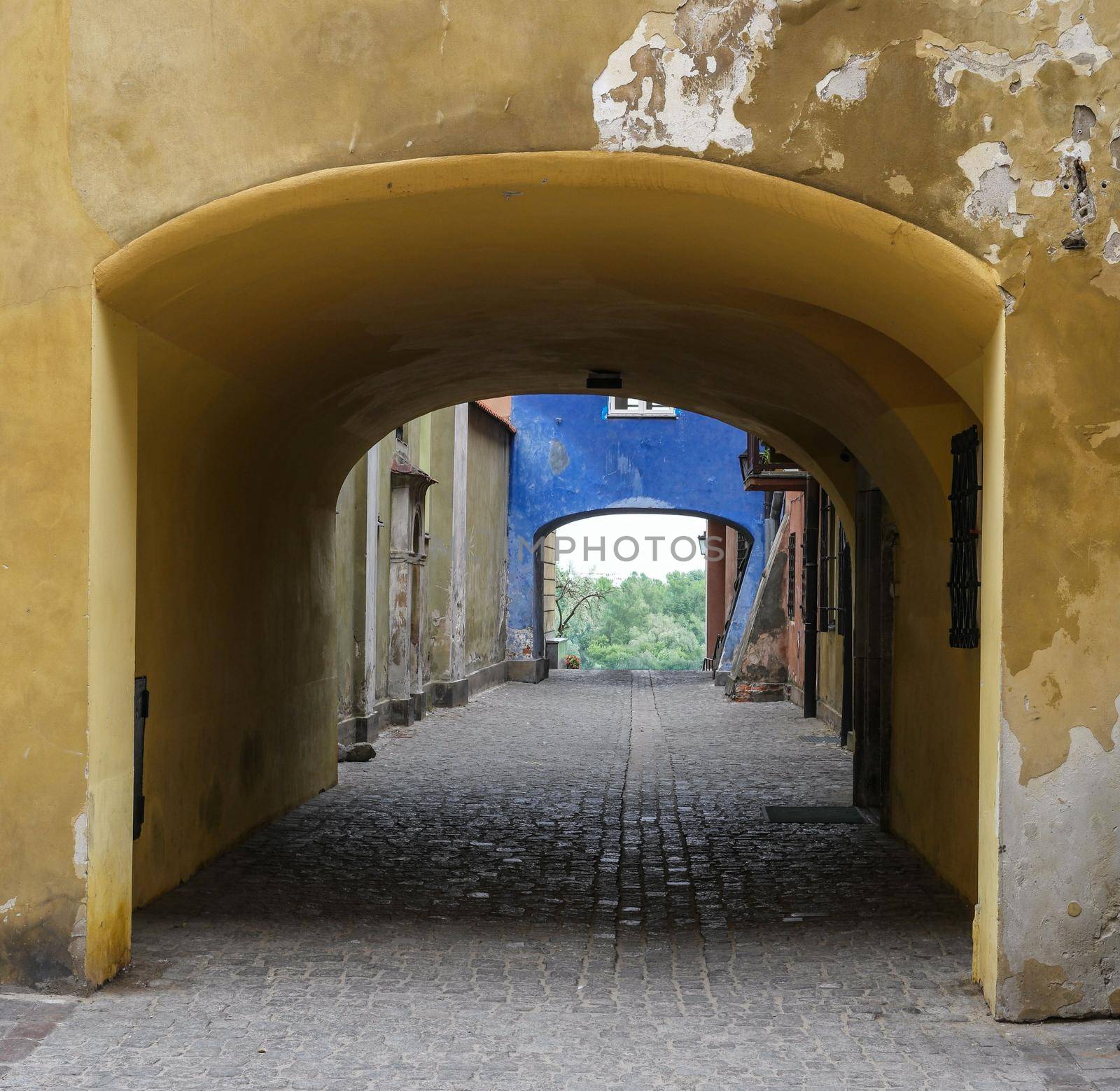 blue archway in historical part of Warsaw