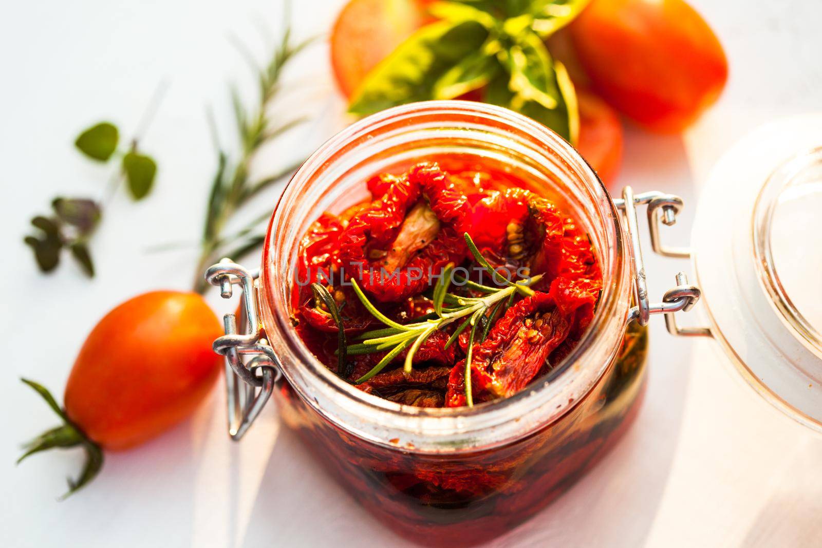 sun dried tomatoes in a glass jar