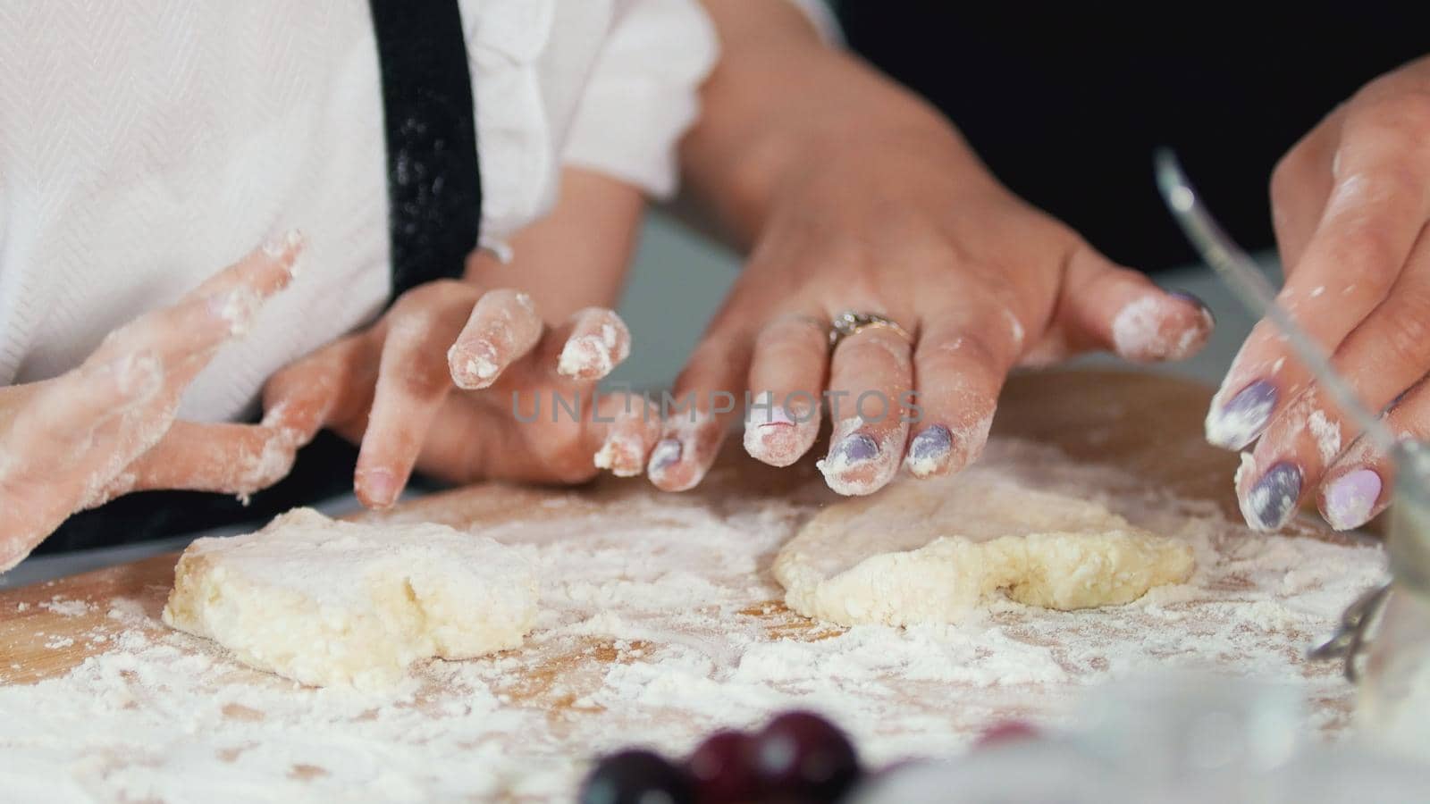 Female hands forms homemade pancakes from cottage cheese, close up