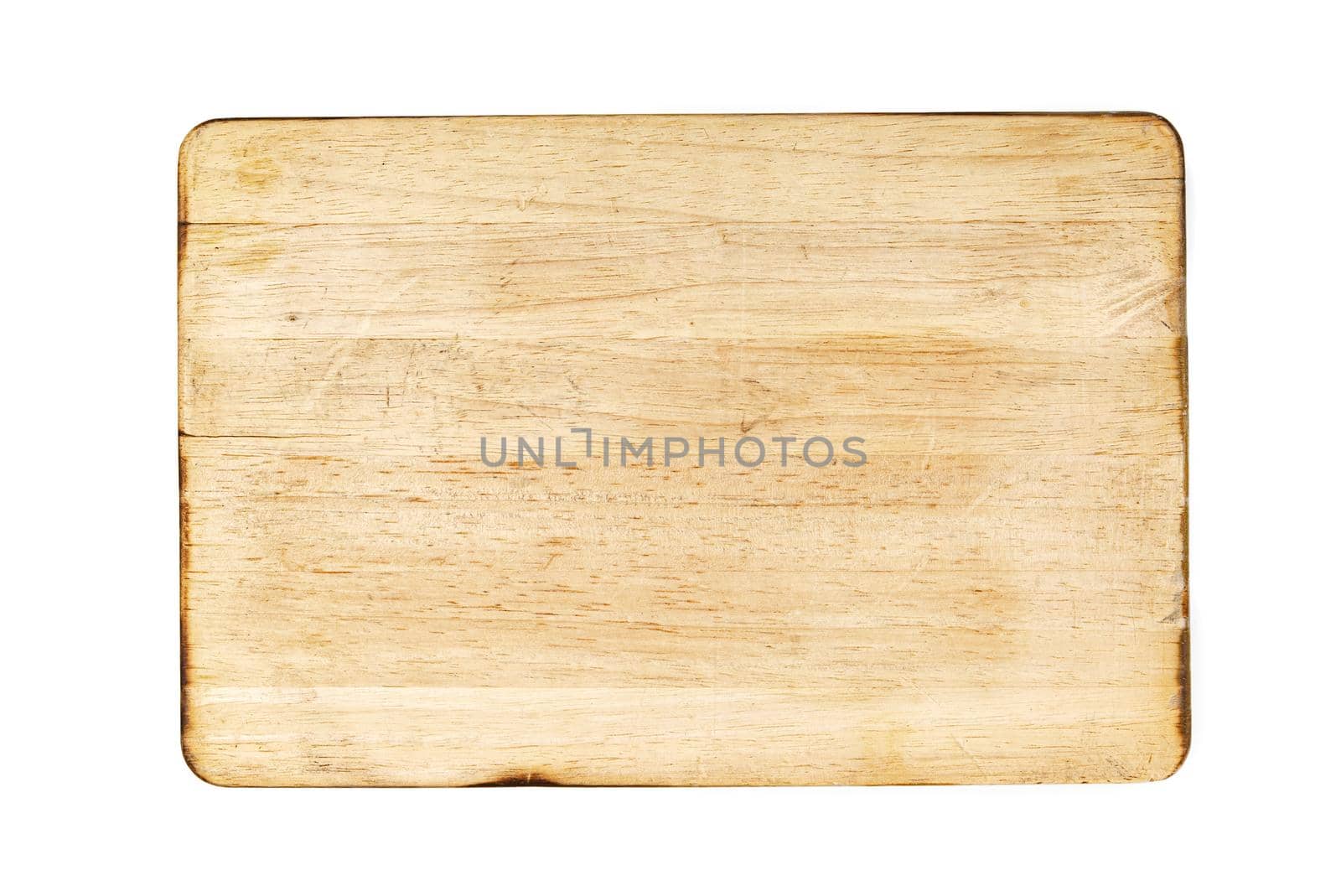 Wooden cutting board on a white background, close up