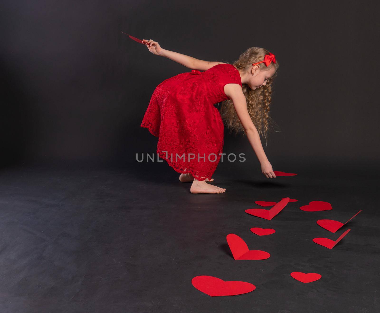 paper hearts love red, heart valentine's day, on the floor hearts romance wedding. art. emotions formula of love, joy in a red dress girl, barefoot