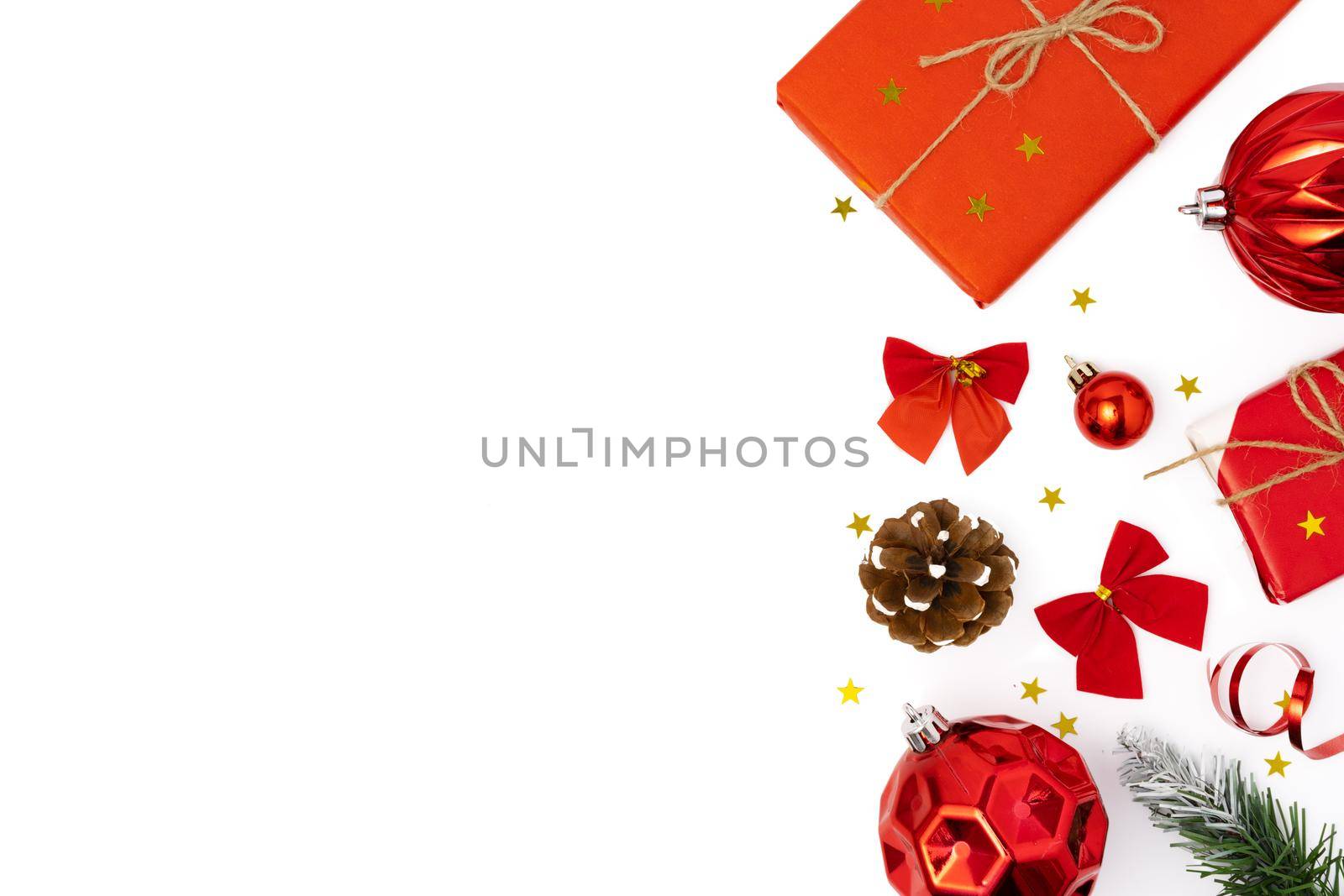 Top view Christmas decorations composition on white background with copy space by Fabrikasimf