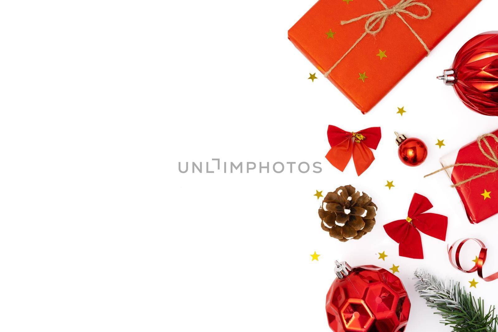 Top view of Christmas decorations composition on white background with copy space