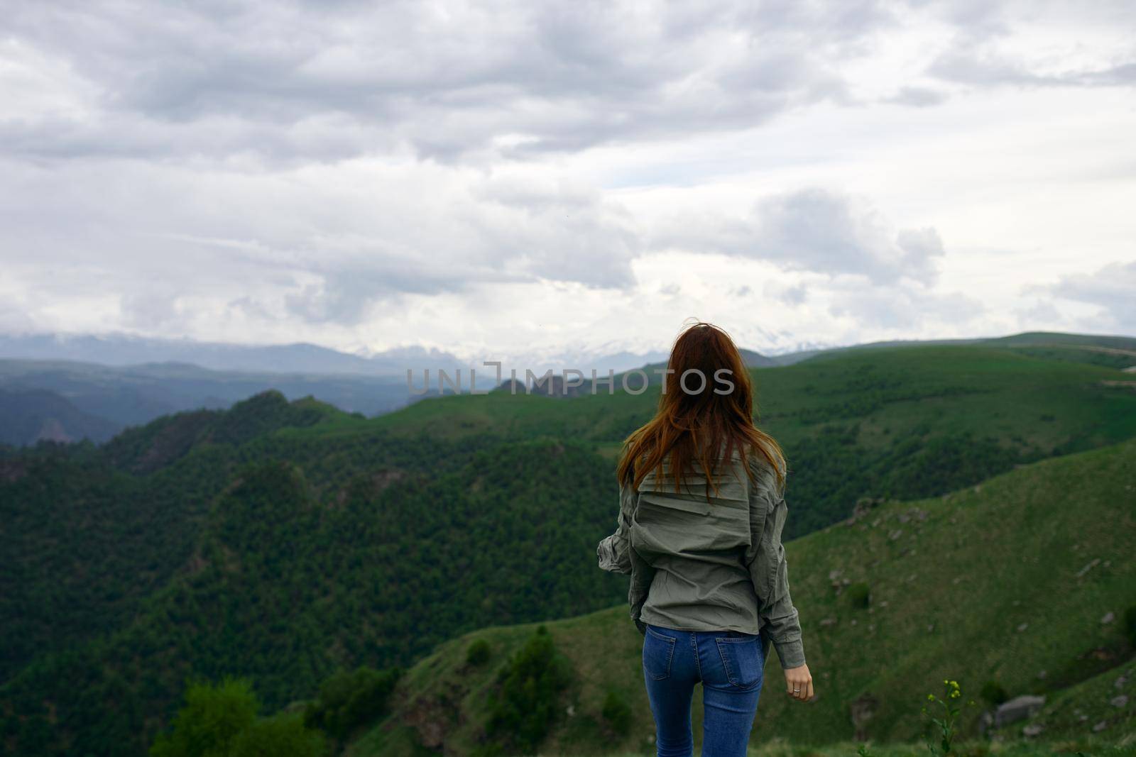 woman hiker mountains travel landscape adventure. High quality photo