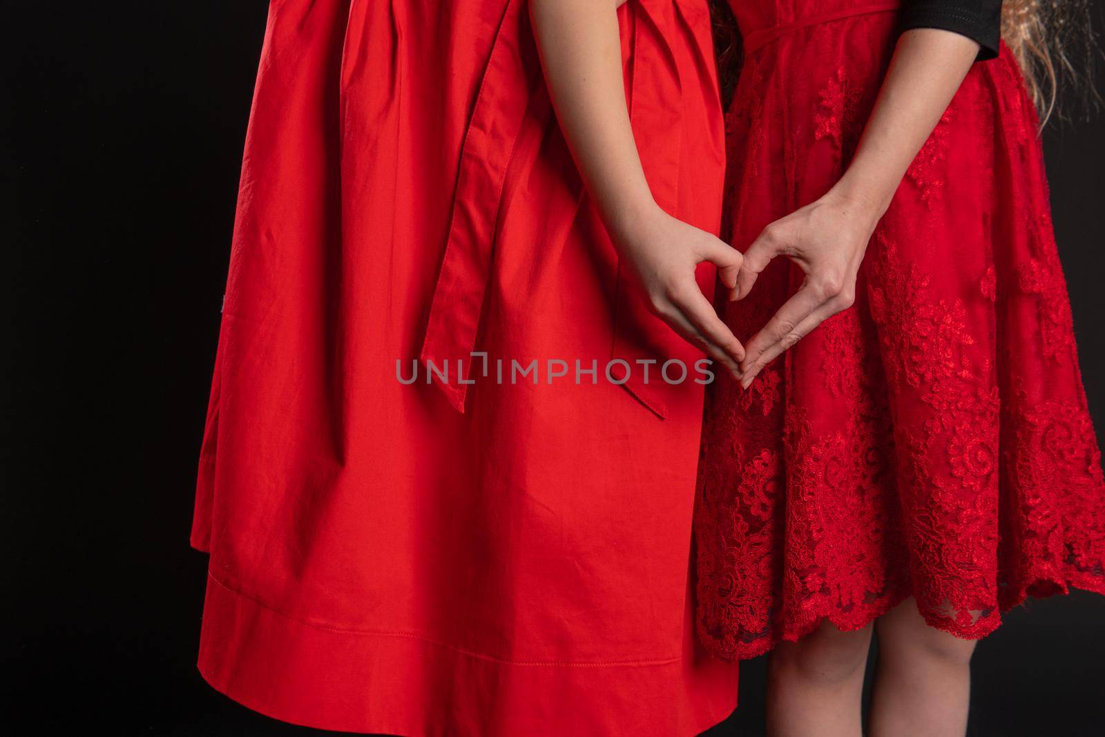 Girl and child sign of love hands keep happy, board flirting, on the floor hearts married. formula banner. event forever, joy in red girl dress, barefoot by 89167702191