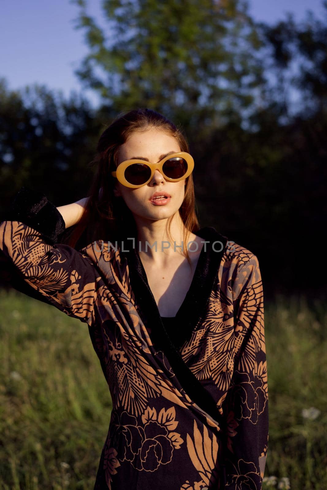 fashionable woman in sunglasses outdoors summer glamor. High quality photo