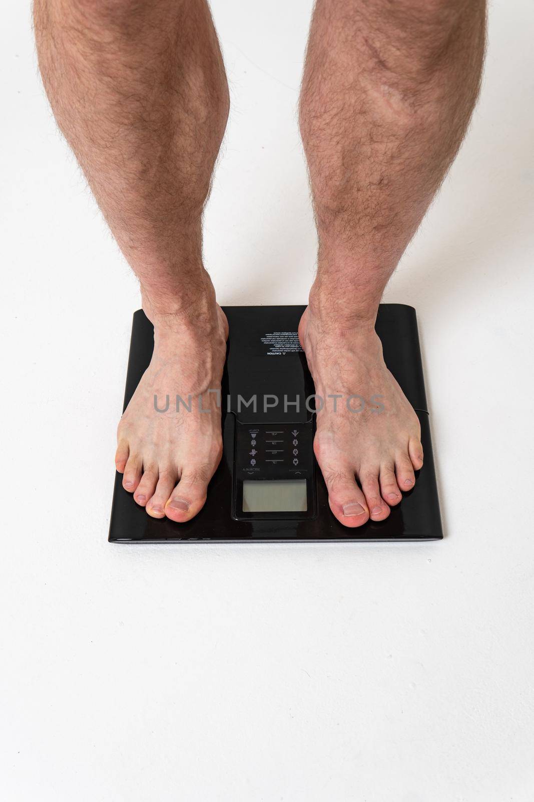 Man with weights health pondered, health and sports on a white background back body injury, spine caucasian young medicine, human chronic. Touching lumbar sickness, lower suffer attractive
