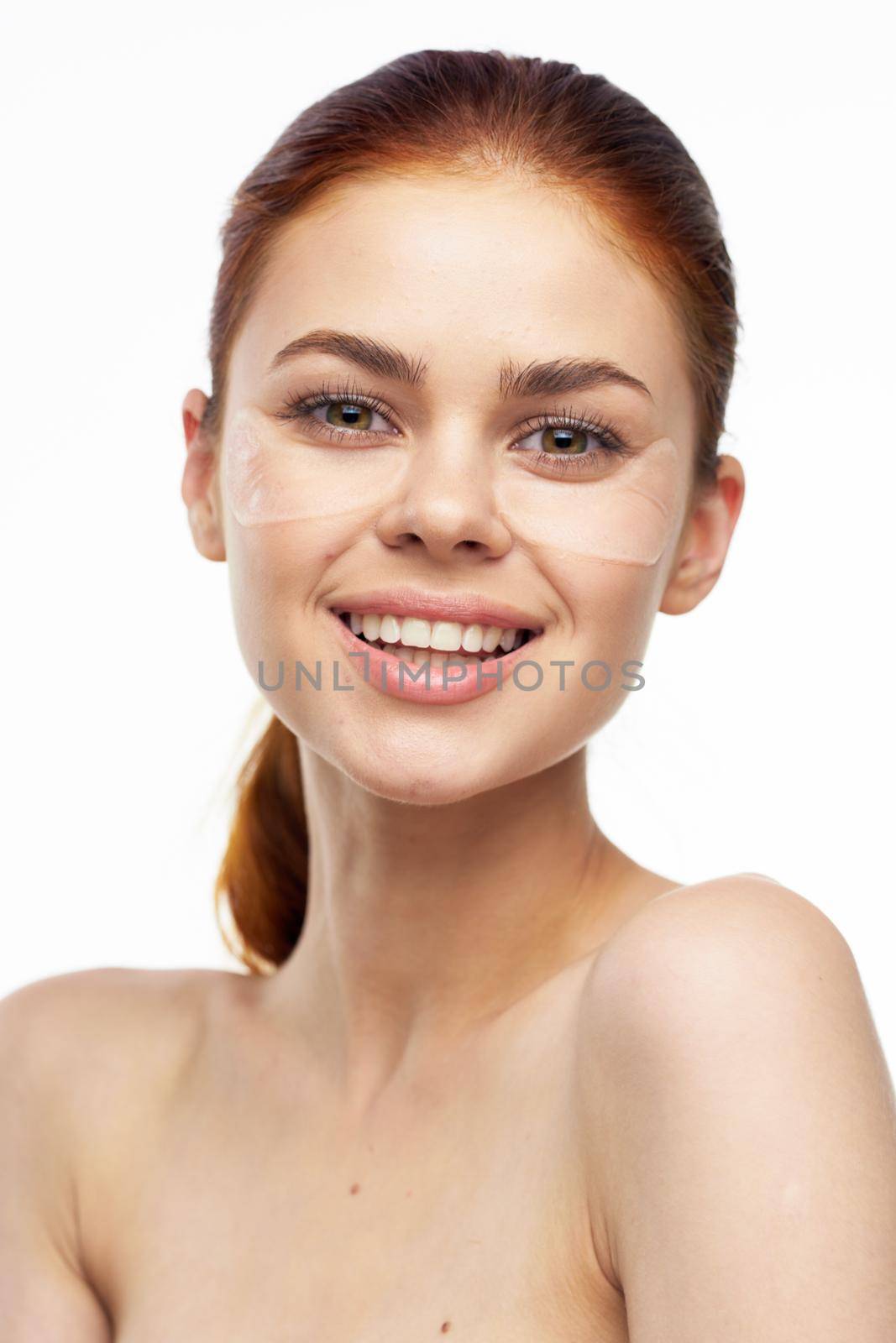 cheerful woman bare shoulders clear skin face mask by Vichizh