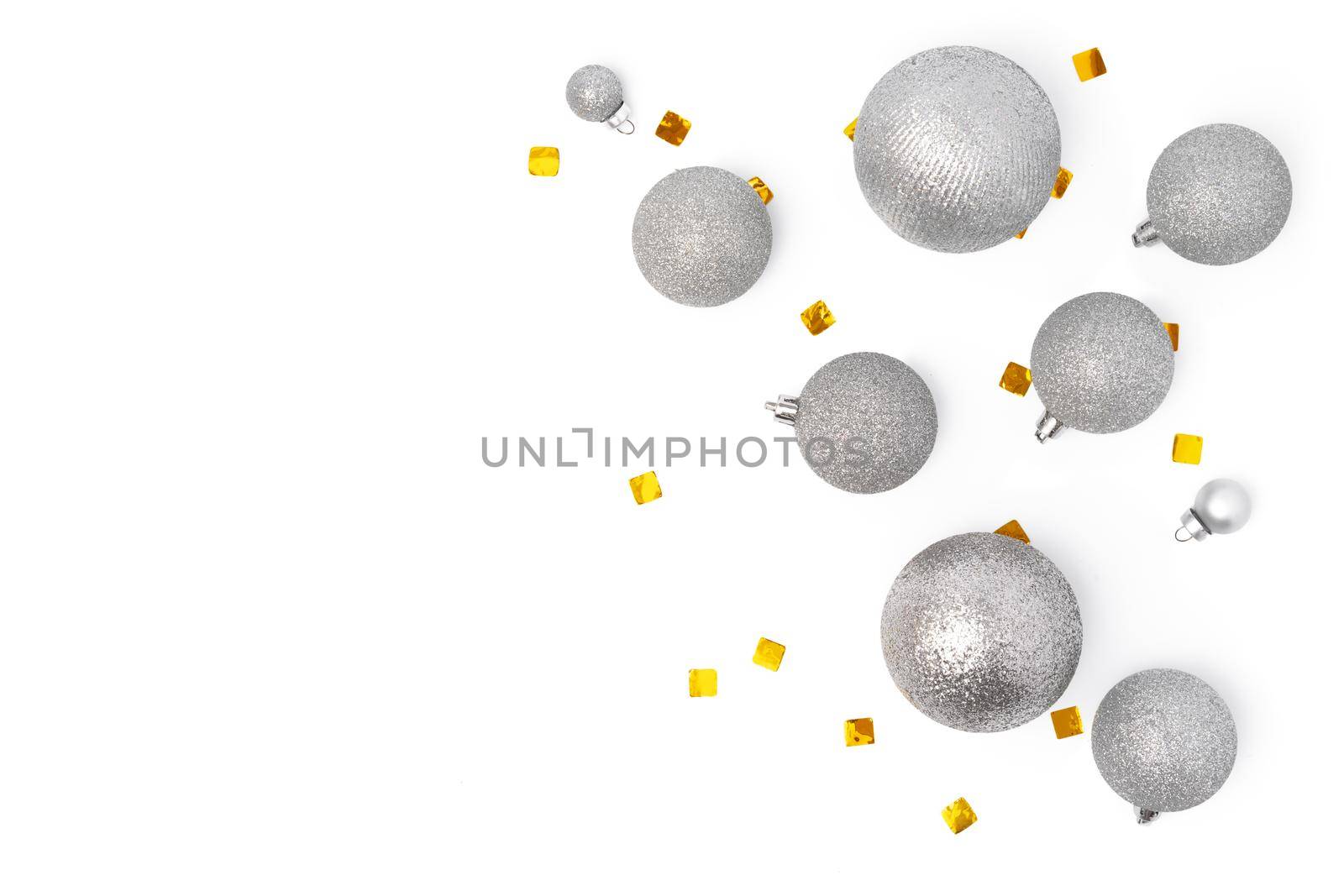 Top view of Christmas decorations composition on white background with copy space