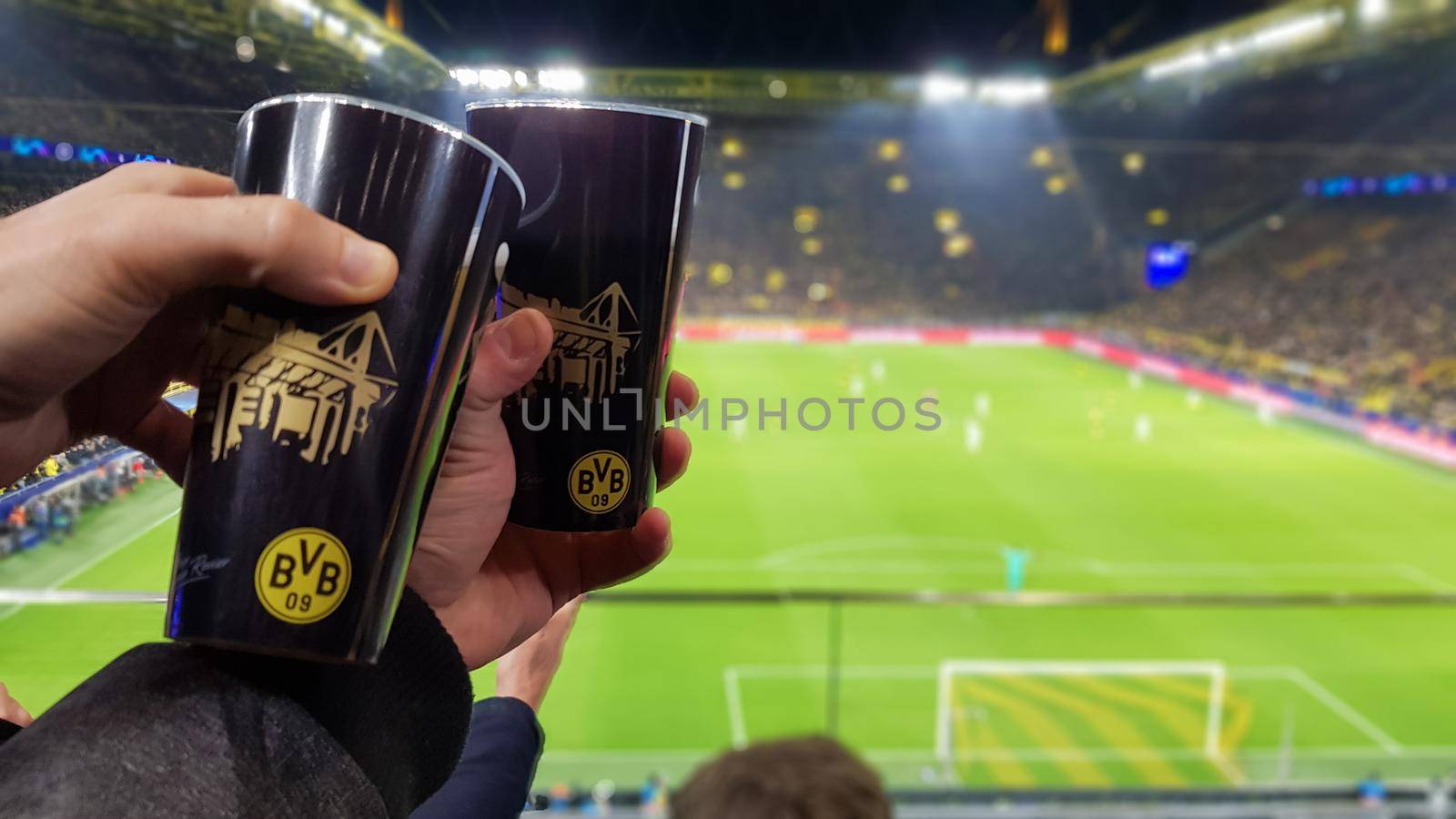 Germany, Dortmund - February 18, 2020. Borussia fans celebrate their teams victory during a match at the BVB home stadium with the French team Paris Saint - Germain, PSG.