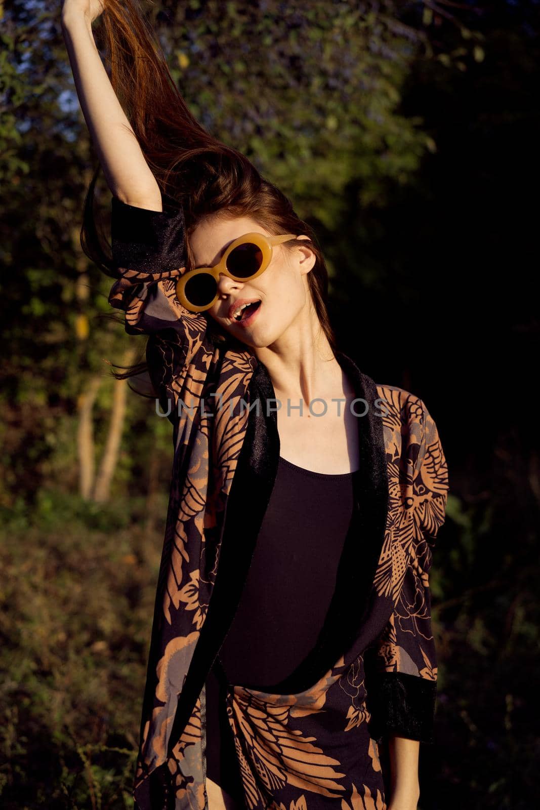 woman wearing sunglasses outdoors posing fashion glamor by Vichizh