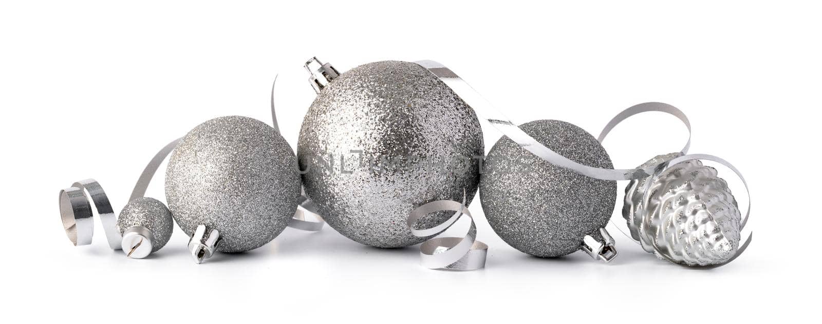 Silver sparkling Christmas baubles isolated on white background, close up