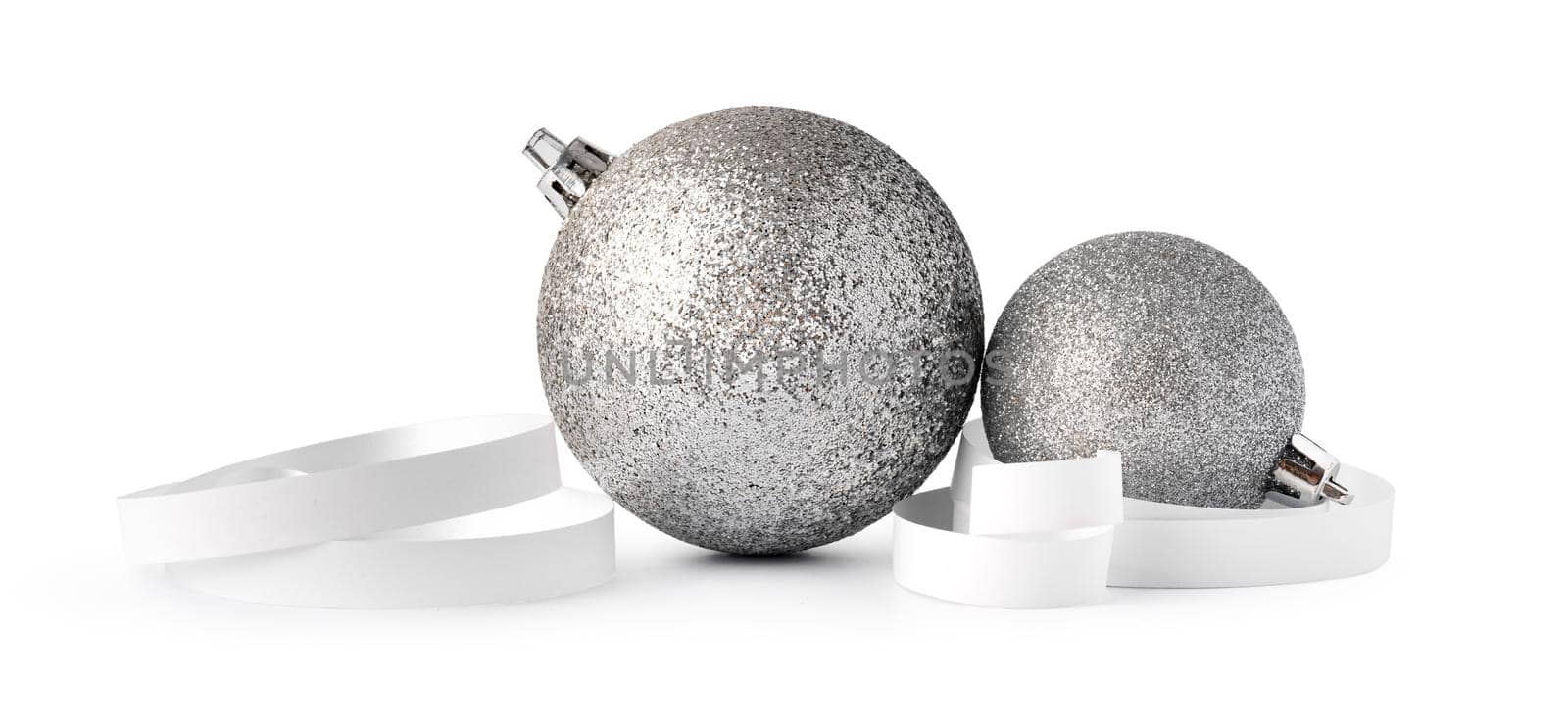 Silver sparkling Christmas baubles isolated on white background, close up