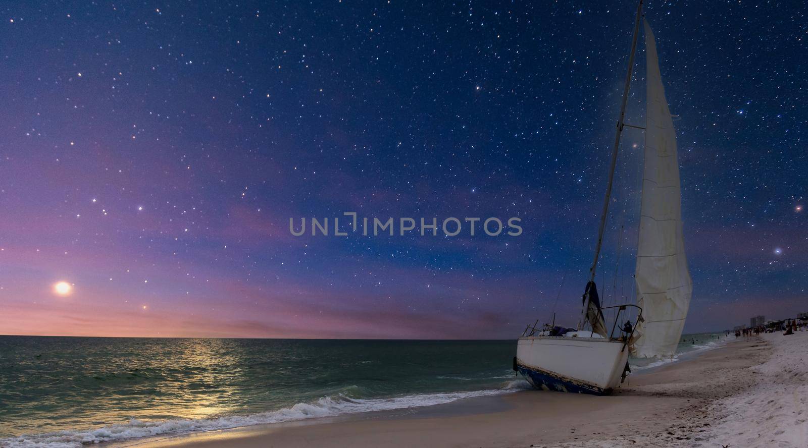 Night sky over shipwreck on the coast of Clam Pass in Naples, Florida