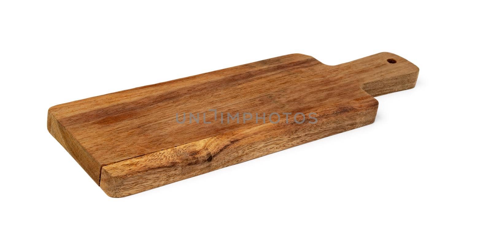 Wooden cutting board on a white background, close up